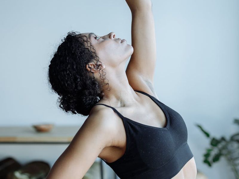 Detailed close-up of a yoga practitioner's movements